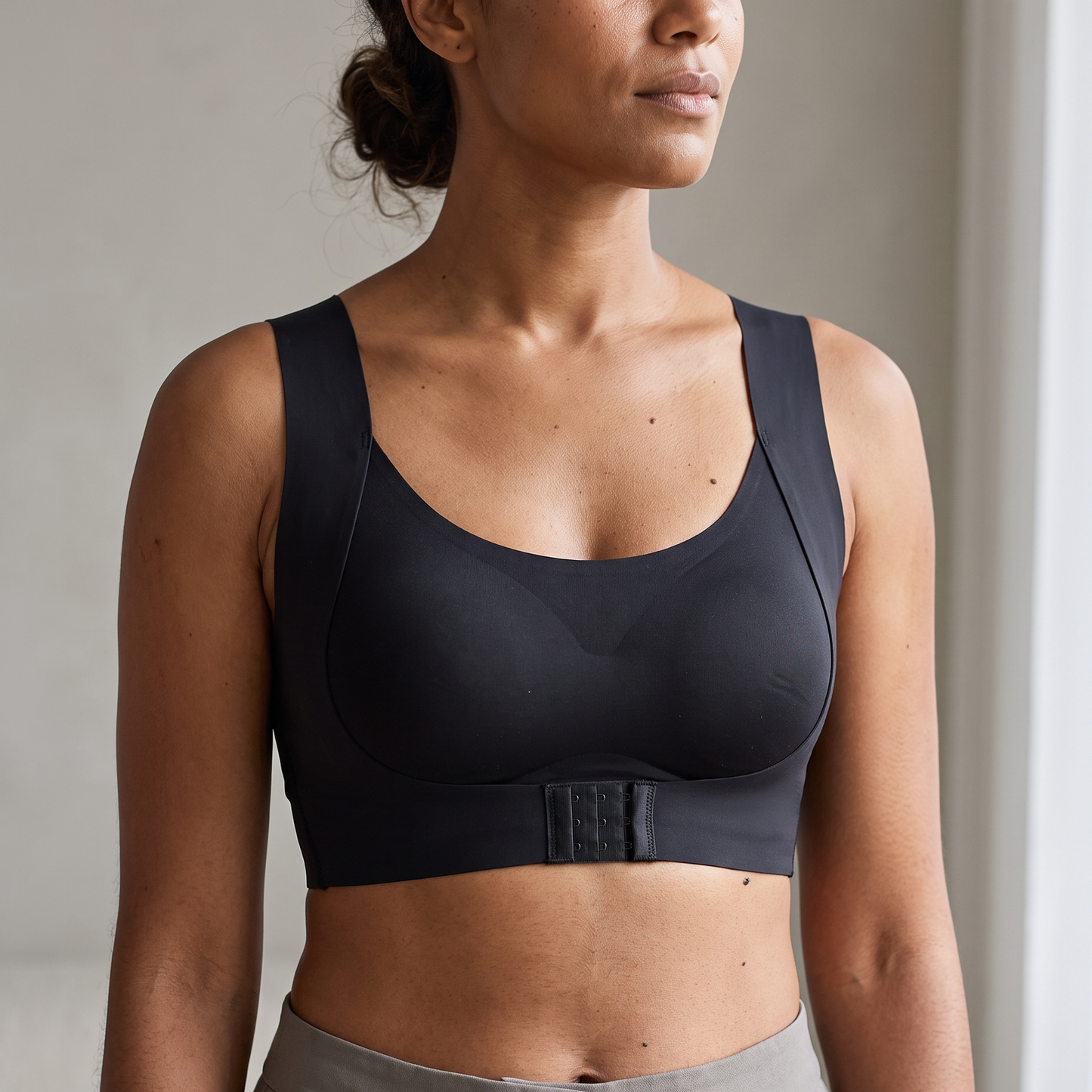 Velora Posture Bra in black, worn, front view